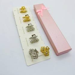 BROCHE EN TIRA